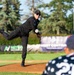 F-22 Demonstration Team crew chief throws the first pitch for the St. Cloud Rox