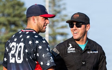 F-22 Demonstration Team crew chief throws the first pitch for the St. Cloud Rox