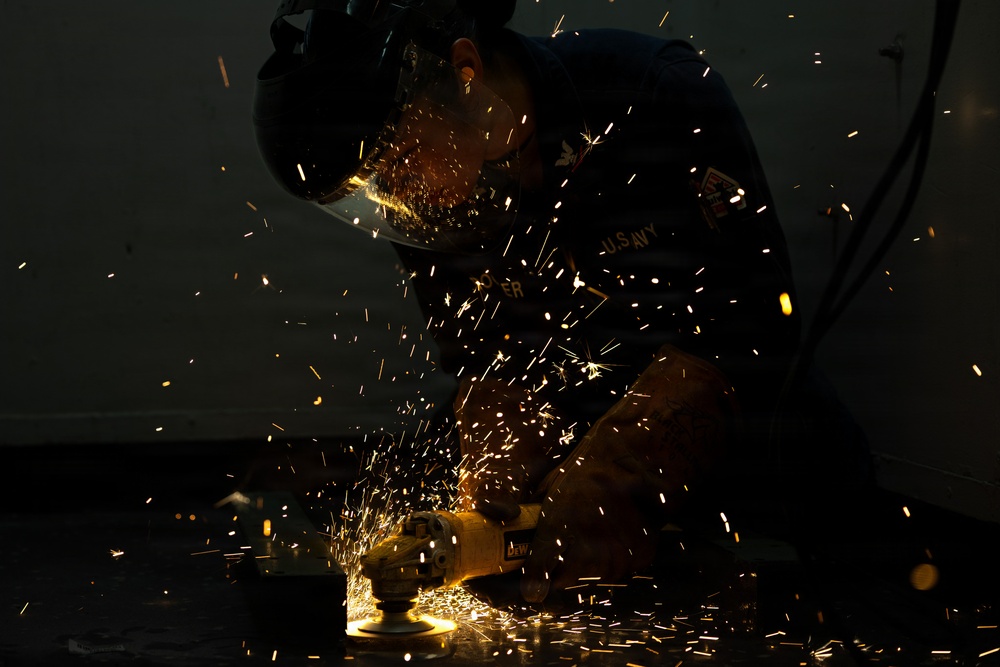 John Paul Jones Sailor Conducts Maintenance