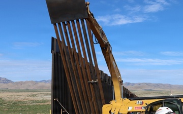 Engineers place final barrier panel at NDA-1