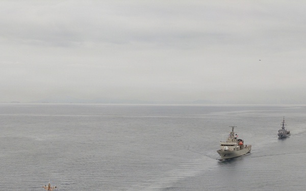 U.S. Coast Guard and partner nations conduct a formation sail during PANAMAX26