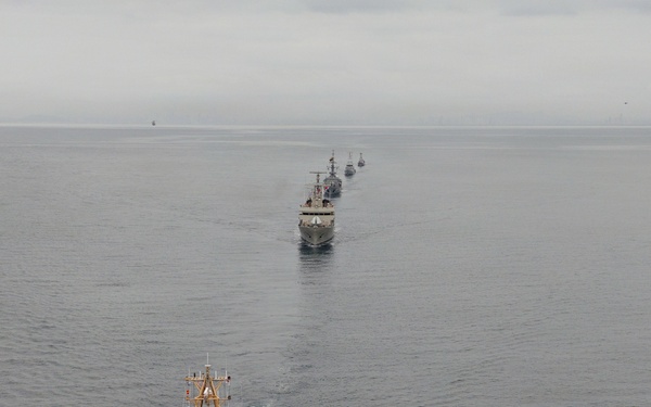 U.S. Coast Guard and partner nations conduct a formation sail during PANAMAX26