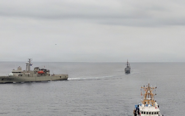 U.S. Coast Guard and partner nations conduct a formation sail during PANAMAX26