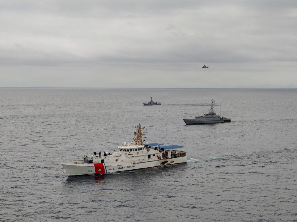 U.S. Coast Guard and partner nations conduct a formation sail during PANAMAX26