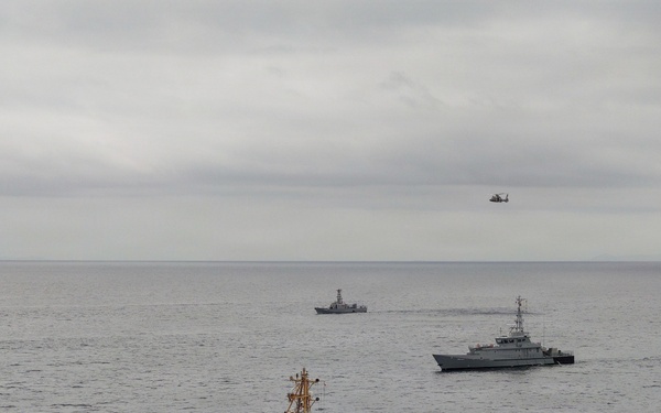 U.S. Coast Guard and partner nations conduct a formation sail during PANAMAX26