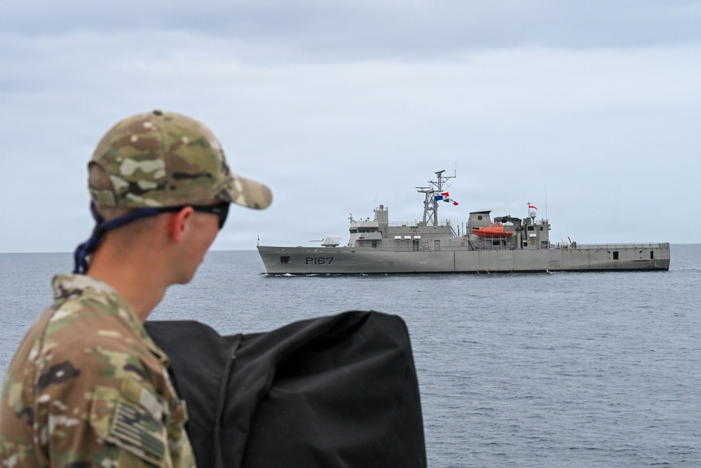U.S. Coast Guard and partner nations conduct a formation sail during PANAMAX26