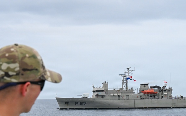 U.S. Coast Guard and partner nations conduct a formation sail during PANAMAX26