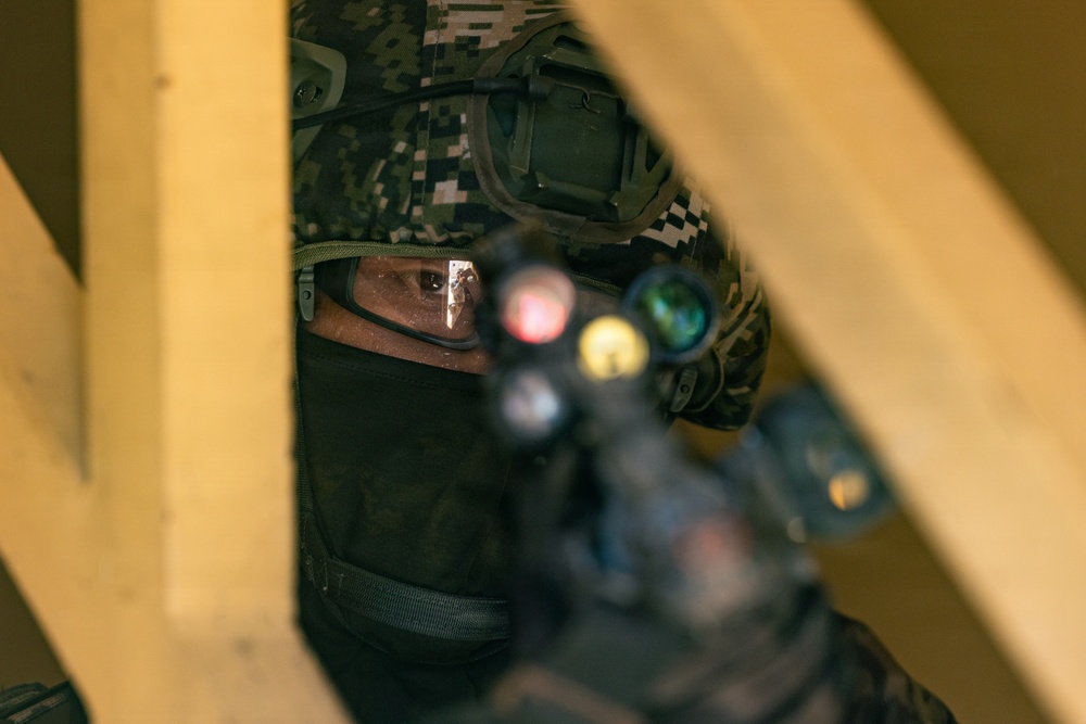 U.S. Marines with Echo Co., 2nd Bn., 1st Marines, rehearse platoon attacks with ROK Marines during AFX