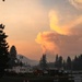 Pyrocumulus cloud rises over wildfire incident command post in Pacific Northwest forest