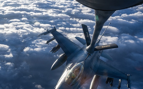 KC-135 refuels F-16s in support of regional security