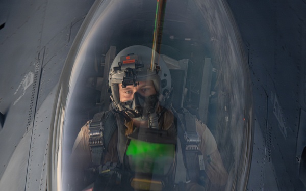 KC-135 refuels F-16s in support of regional security