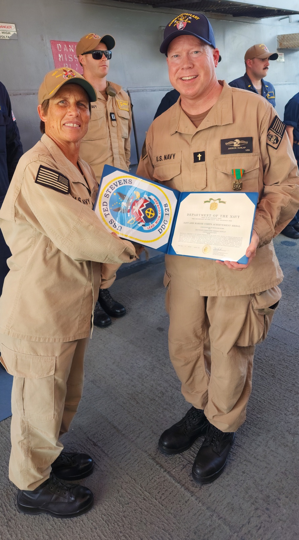 Chaplain Judson Dunlap is rung ashore having completed his assignment onboard USS Ted Stevens (DDG 128).