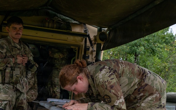 Behind the Guns: 1-201st FA Soldier Prepares for Fire Mission
