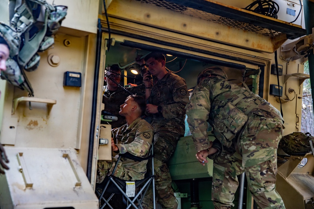 Behind the Guns: 1-201st FA Soldier Prepares for Fire Mission