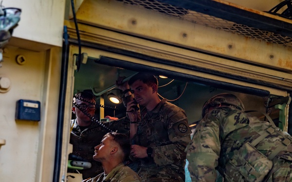 Behind the Guns: 1-201st FA Soldier Prepares for Fire Mission