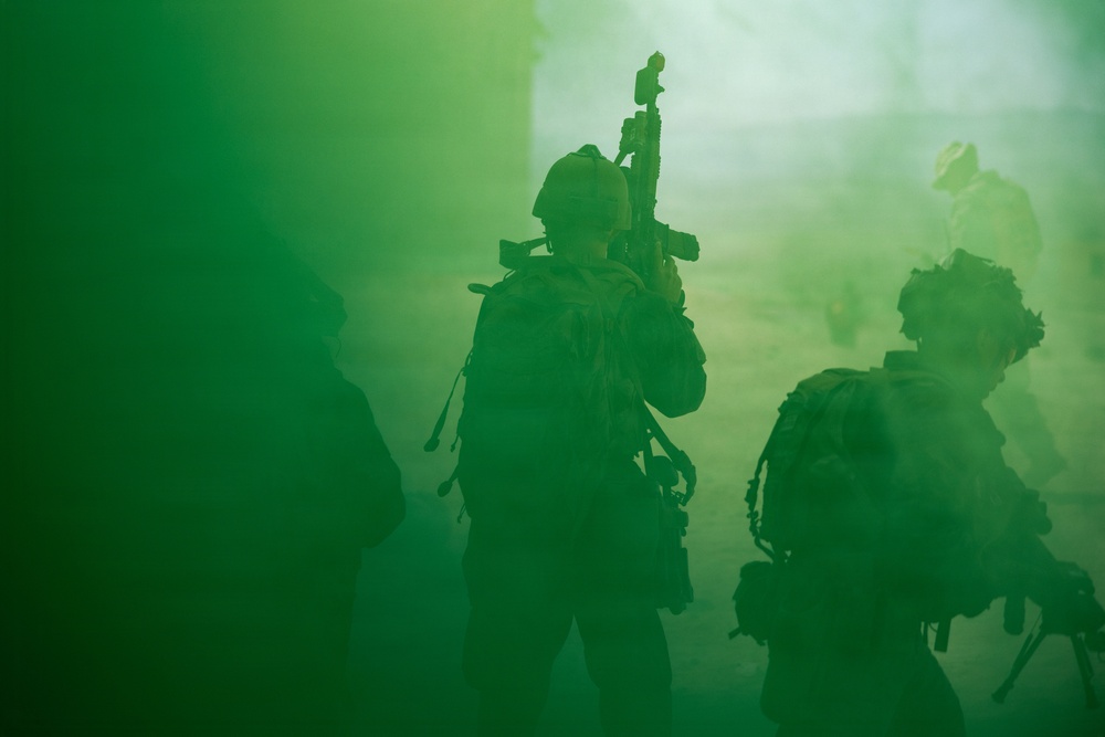 U.S. Marines with 2nd Bn., 1st Marines, rehearse company attacks during AFX