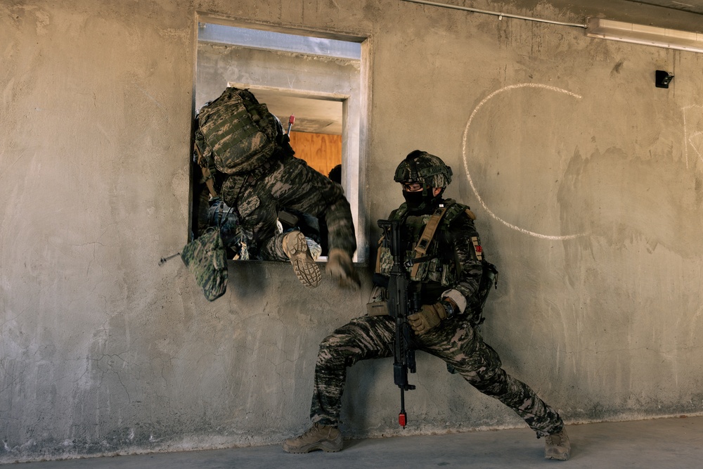 U.S. Marines with 2nd Bn., 1st Marines, rehearse company attacks during AFX
