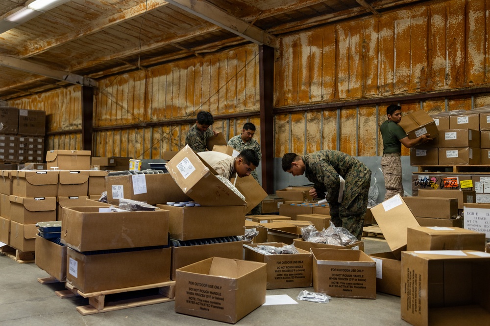 U.S. Marines with 2nd Bn., 1st Marines, provide hot chow during AFX