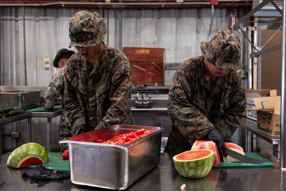 U.S. Marines with 2nd Bn., 1st Marines, provide hot chow during AFX