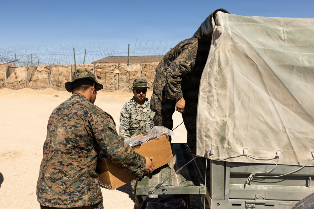 U.S. Marines with 2nd Bn., 1st Marines provide hot chow during AFX