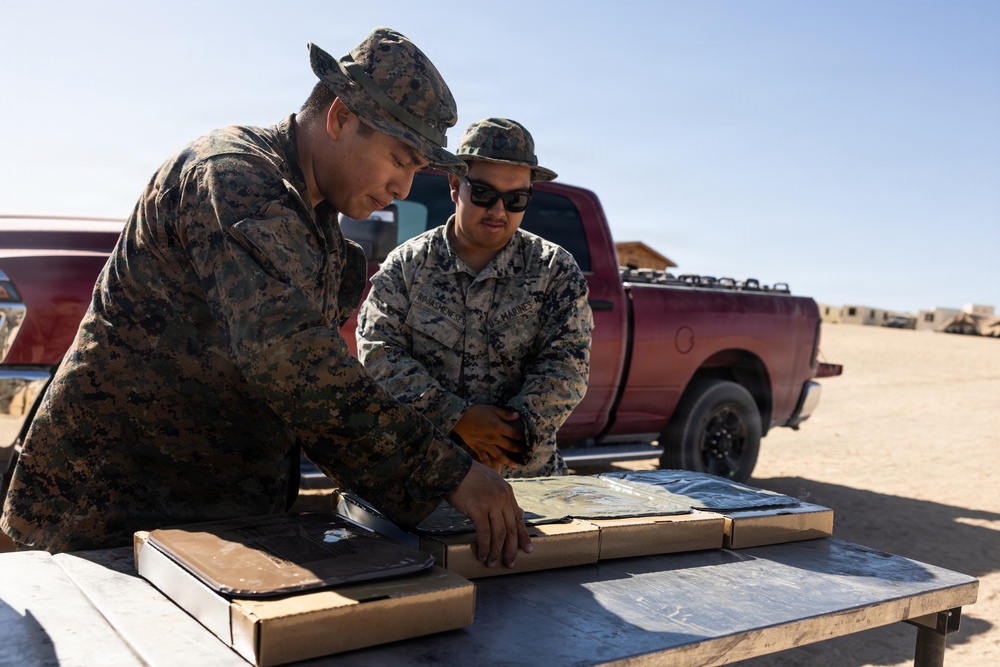 U.S. Marines with 2nd Bn., 1st Marines provide hot chow during AFX