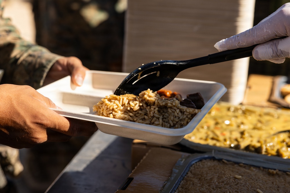 U.S. Marines with 2nd Bn., 1st Marines provide hot chow during AFX