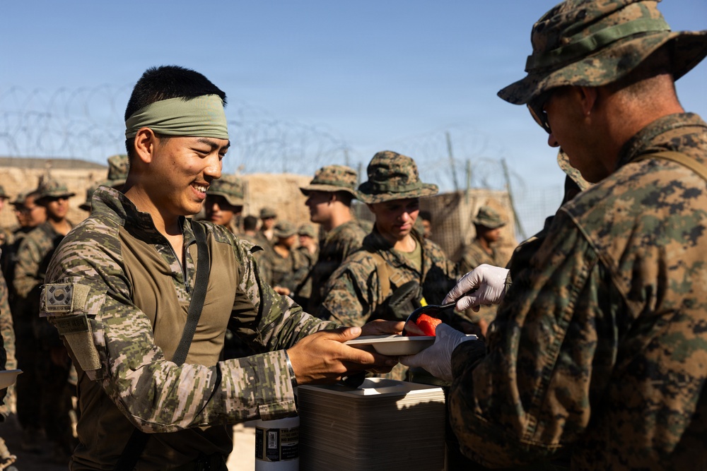 U.S. Marines with 2nd Bn., 1st Marines provide hot chow during AFX