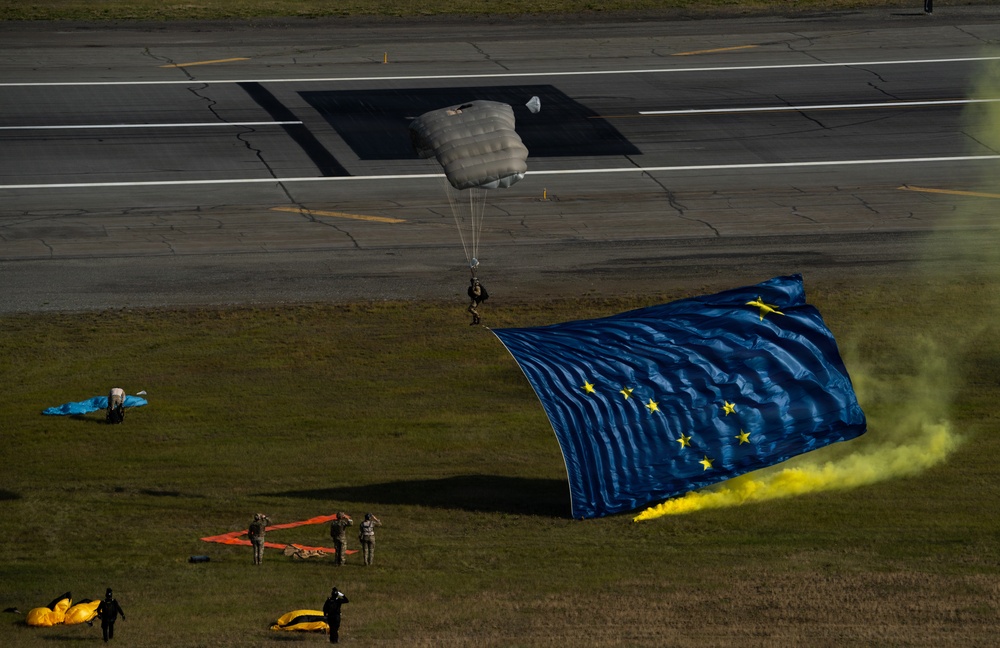 Alaska Air National Guard pararescuemen conduct aerial demonstrations for the opening ceremony of the Arctic Thunder Open House 2026