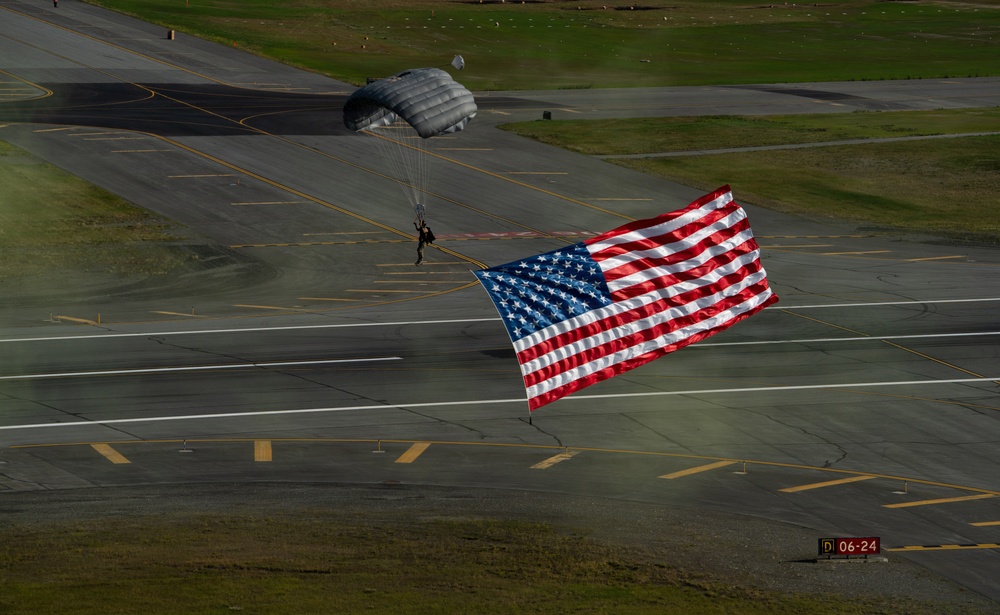 Alaska Air National Guard pararescuemen conduct aerial demonstrations for the opening ceremony of the Arctic Thunder Open House 2026
