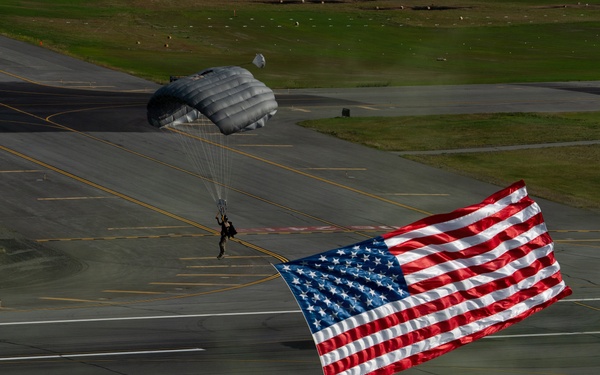 Alaska Air National Guard pararescuemen conduct aerial demonstrations for the opening ceremony of the Arctic Thunder Open House 2026