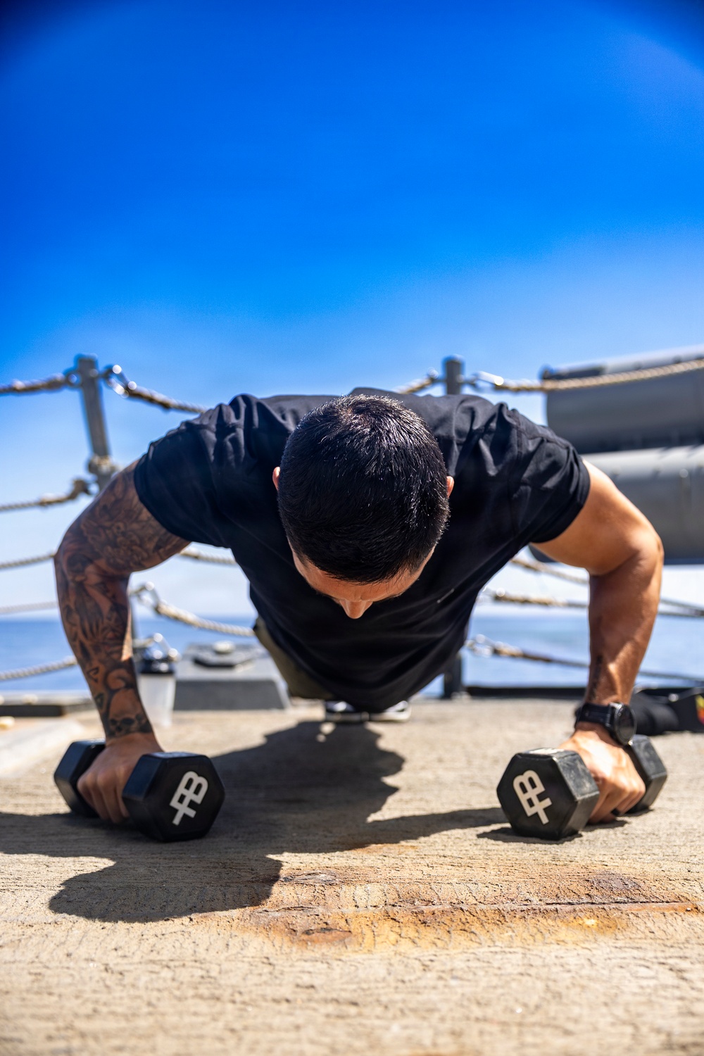 U.S. Navy Sailor Worksout Midships
