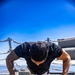 U.S. Navy Sailor Worksout Midships