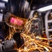 Hull Maintenance Technician Prepares KLE Gift
