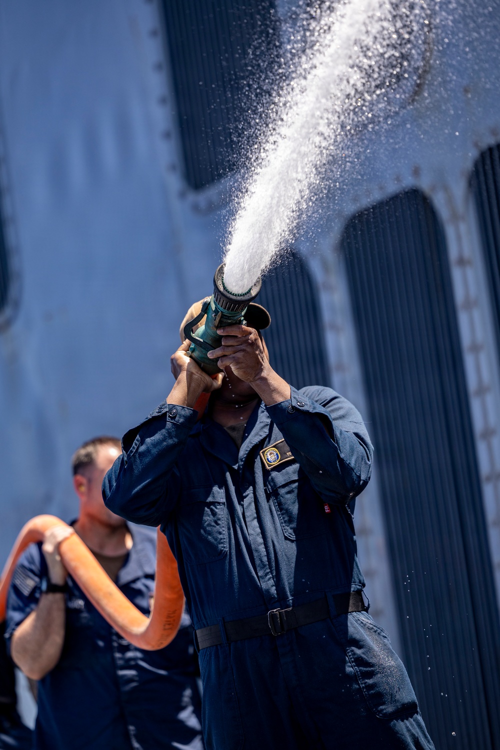 Fresh Water Washdown With USS Roosevelt (DDG 80) Crew