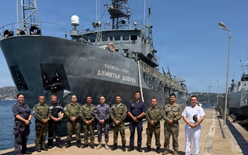 U.S. Navy Lt. Jaramillo Poses with Allied Officers