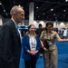 Senior leaders with the Defense Health Agency tour AD-RDA/CAE display during MHSRS 2026