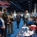 Senior leaders with the Defense Health Agency tour AD-RDA/CAE display during MHSRS 2026