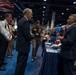 Senior leaders with the Defense Health Agency tour AD-RDA/CAE display during MHSRS 2026