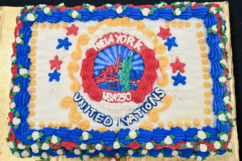 CS3 Madison Heard Prepares Cake for UN Reception