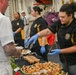 CS3 Madison Heard Serves Food During CNO Reception