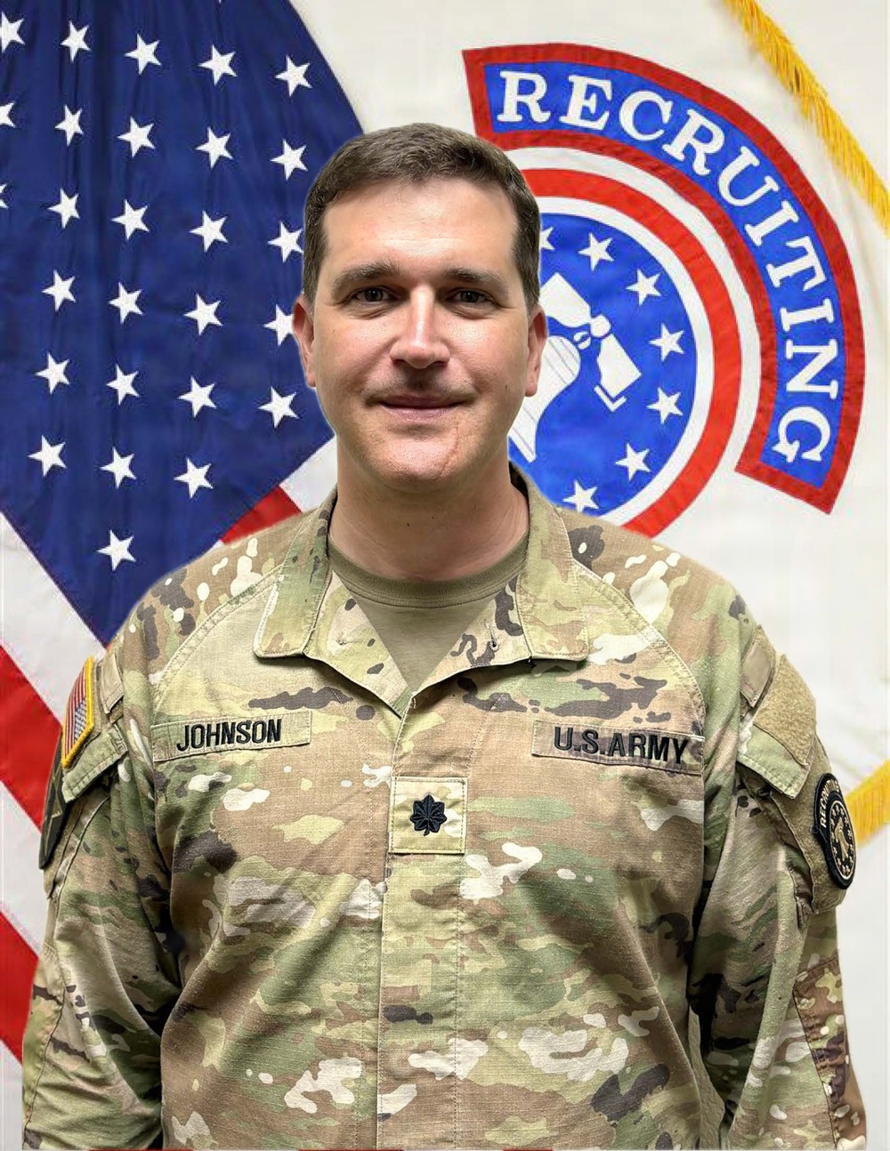 A U.S. Army officer in Operational Camouflage Pattern (OCP) uniform poses for an official portrait photo. The name tape reads 'JOHNSON' and the rank insignia on the chest pocket indicates the rank of Major (O-4), denoted by the black oak leaf cluster. The background features the U.S. flag and a U.S. Army Recruiting Command guidon/flag.