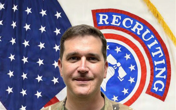 A U.S. Army officer in Operational Camouflage Pattern (OCP) uniform poses for an official portrait photo. The name tape reads 'JOHNSON' and the rank insignia on the chest pocket indicates the rank of Major (O-4), denoted by the black oak leaf cluster. The background features the U.S. flag and a U.S. Army Recruiting Command guidon/flag.