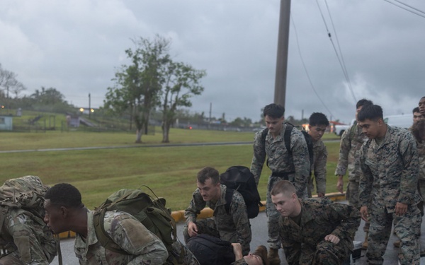 Corporal’s Course 4-26 simulated casualty evacuation and resupply PT