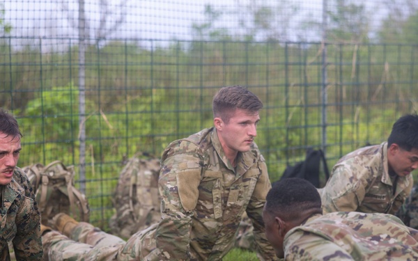 Corporal’s Course 4-26 simulated casualty evacuation and resupply PT