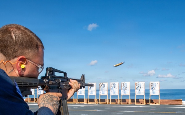 Sailor Trains With M4 Carbine