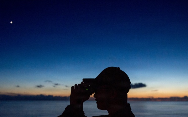 Sailor Stands Watch At Sundown