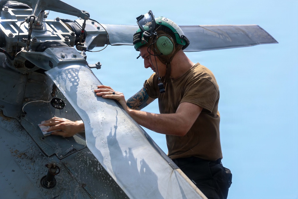 John Finn Washes A Helicopter