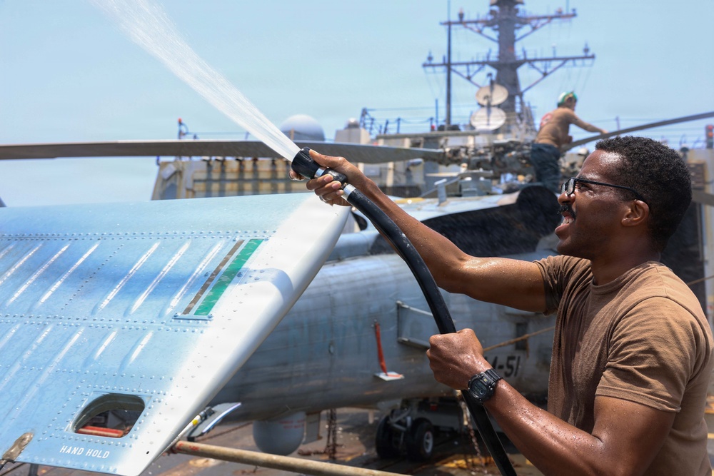 John Finn Washes A Helicopter
