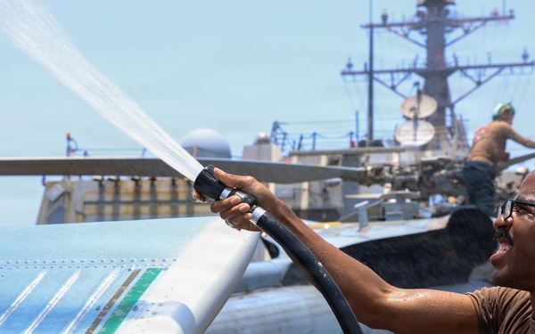 John Finn Washes A Helicopter