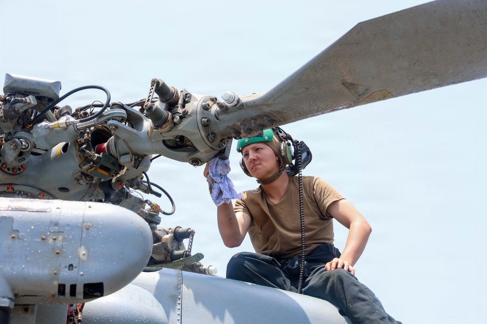 John Finn Washes A Helicopter